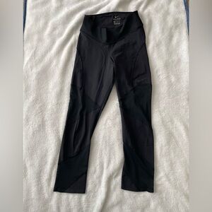 Nike XS Black High-Waisted cropped Leggings with sheer design